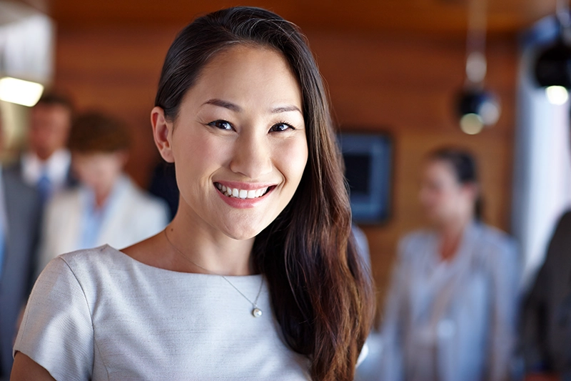 Contact Seibert Complete Dentistry. Woman at front desk of cincinnati office.