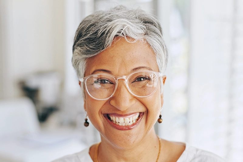 Contact Seibert Complete Dentistry. Woman at front desk of cincinnati office.