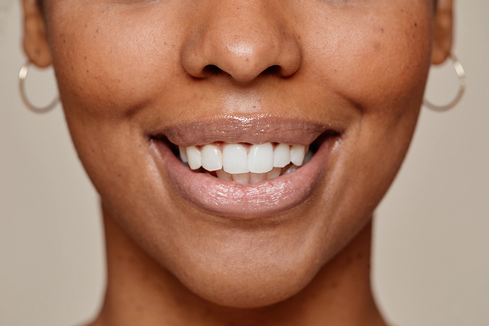 Contact Seibert Complete Dentistry. Woman at front desk of cincinnati office.