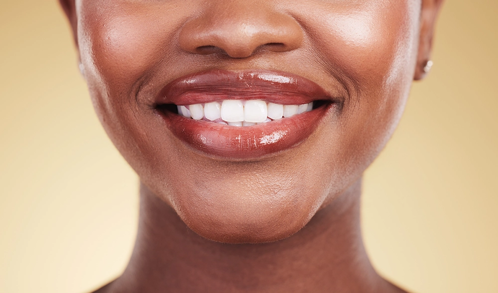 Contact Seibert Complete Dentistry. Woman at front desk of cincinnati office.